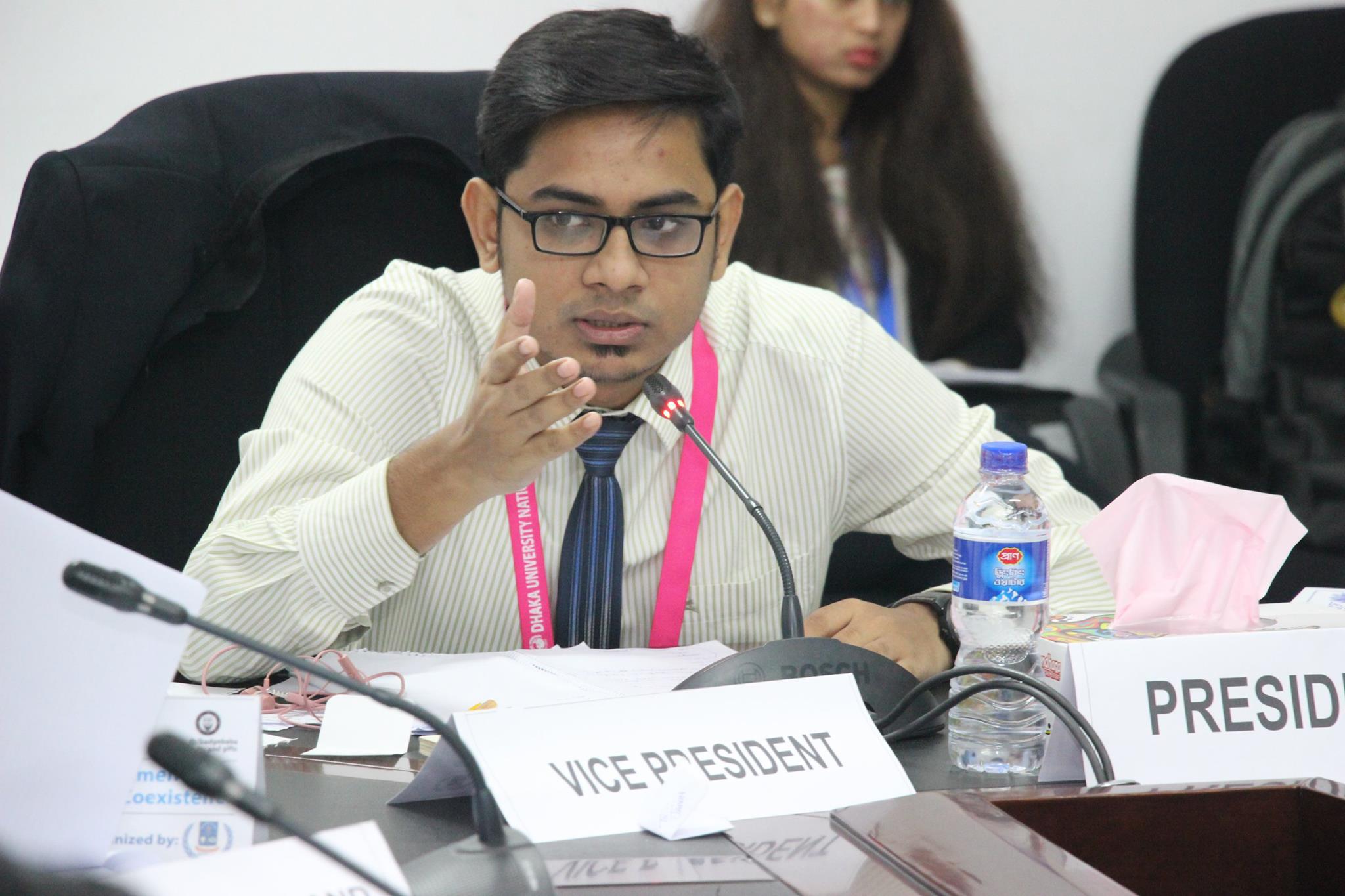 Rubiat Saimum speaking during a formal meeting